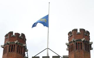 A flag is flown at half-mast at Bancroft's, independent school in Woodford Green, east London, where the 14-year-old boy killed in a sword attack in Hainault, is understood to have attended