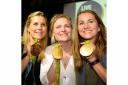 Georgie Twigg, Hollie Webb and Shona McCallin show off their Olympic gold medals (pic Graham Hodges)