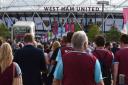 West Ham fans descend on the Olympic Stadium in Stratford for their first home game