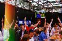 Hackney football fans celebrate in BOXPARK Shoreditch during EURO 2020.