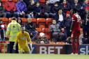 Leyton Orient goalkeeper Alex Cisak (centre) shows his frustration (pic: Simon O'Connor).
