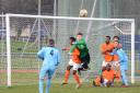 The Tower Hamlets keeper punches clear against FC Romania (pic: Tim Edwards)
