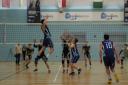 University of East London men's volleyball team in action against their Cambridge rivals