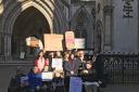 Supporters of families fighting a legal battle against Hackney Council over cuts to special educational needs funding gather outside the High Court ahead of a hearing. PRESS ASSOCIATION Photo. Issue date: Wednesday October 31, 2018. See PA story COURTS Ha
