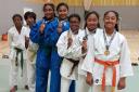 Heart of Oak youngsters show off the judo medals won for Redbridge at the London Youth Games