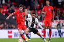 England\'s Declan Rice (left) and Germany\'s Jamal Musiala battle for the ball at Wembley Stadium
