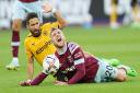 Wolverhampton Wanderers\' Joao Moutinho and West Ham United\'s Jarrod Bowen (right) battle for the ball