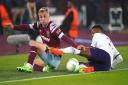 West Ham United\'s Jarrod Bowen and Anderlecht\'s Hannes Delcroix battle for the ball