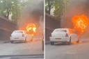 Screengrabs from a video posted to Twitter by @balanceismyname show a white limousine on fire at the side of the road