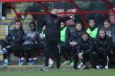 Leyton Orient head coach Richie Wellens issues instructions from the dugout