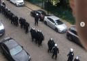 Met Police officers removed people from an address in Shadwell