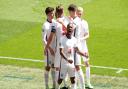 Raheem Sterling celebrates scoring England's goal with team-mates during the UEFA Euro 2020 Group D match against Croatia.