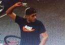 A CCTV image shows a man police wish to trace following a Shoreditch incident