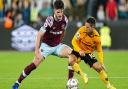 West Ham United\'s Declan Rice (left) and Wolverhampton Wanderers\' Daniel Podence battle for the ball