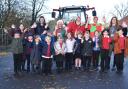 Otley pupils get to meet Farmer Christmas at their school