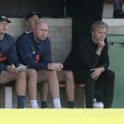 Dagenham & Redbridge manager Daryl McMahon (right) looks on against Gateshead