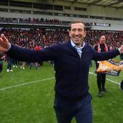 Justin Edinburgh celebrates after Leyton Orient clinched the National League title at Brisbane Road after a goalless draw with Braintree Town (pic: Mark Kerton/PA Images).
