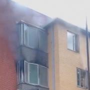 Smoke billowing out of a flat in Old Montague Street