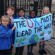 Pupils unfurl their banner in Whitehall