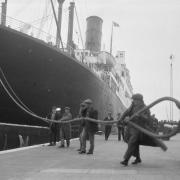 Cunard's 'Tuscania' liner ties up in the Port of London.