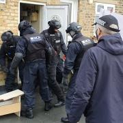 The charges follow raids across east London.
