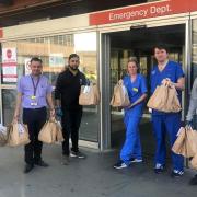 Muhi Mikdad - pictured fourth from the left - drove a fundraising effort with club London Sportif, raising enough money to provide food for up to 300 frontline staff at the Royal London Hospital.