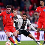 England\'s Declan Rice (left) and Germany\'s Jamal Musiala battle for the ball at Wembley Stadium