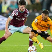 West Ham United\'s Declan Rice (left) and Wolverhampton Wanderers\' Daniel Podence battle for the ball