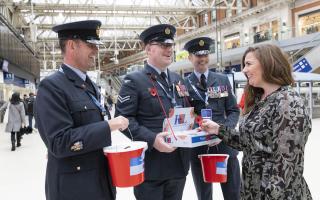 Armed Forces personnel at Waterloo station during the 2022 Poppy Day appeal