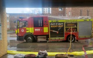 Fire crews in Stratford after a canal caused flooding