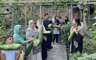 Gardening club members grow their own crops