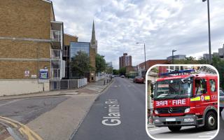 The woman was found inside a flat that had been on fire in Glamis Road